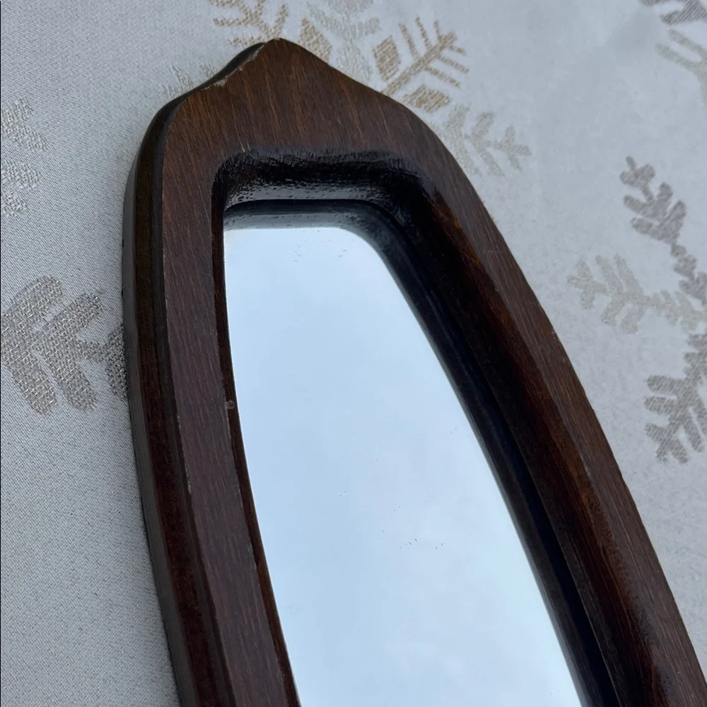 Elegant Brown Wall Mirror with Candle Holder